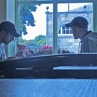 A friendly, inexpensive and "British Food" type cafe - opposite the Hillsborough Visitor Information Centre and former Court House. View from the cafe window. Useful if watching out for friends. Good wholesome food. Doesn't open in the evening.
