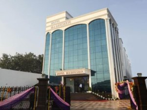 Hotel Madhushrie in Agra, image may contain: Office Building, Convention Center, Shopping Mall, Hotel