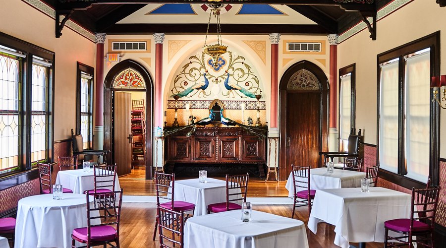 The second floor chapel is an homage to it's previous owners: the Sisters of Mercy until the 1960’s, and then to Peacock’s Florist more recently - Complete with stained glass and hand-painted walls by local artist Carl Fougerousse and several iterations of peacocks hidden throughout.