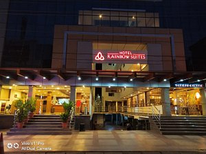 Hotel Rainbow Suites in Kannur, image may contain: Shopping Mall, Restaurant, Lighting, City