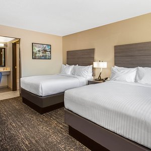Days Inn by Wyndham Merced/Yosemite Area in Merced, image may contain: Furniture, Hotel, Bedroom, Bed