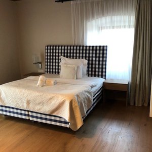 Hotel Lotrinský in Velke Pavlovice, image may contain: Interior Design, Bed, Furniture, Bedroom