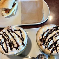 Cappuccinos, breakfast sandwich.