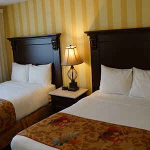 Room with Two Double Beds, Includes mini fridge and microwave, free parking and free wifi.