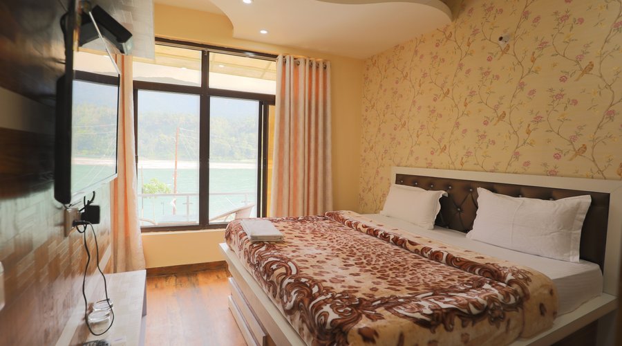 ROOM WITH VIEW OF GANGA, RAJAJI NATIONAL PARK AND MOUNTAINS OF NEELKANTH TEMPLE