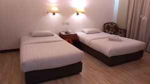D Eastern Hotel in Ipoh, image may contain: Lamp, Bed, Furniture, Bedroom