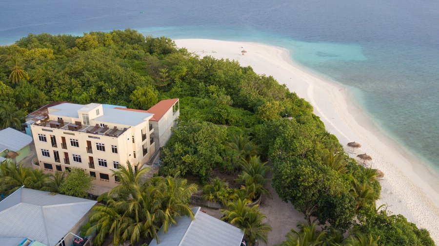 Aerial view of the hotel showing how close the beach is 