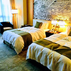 Hotels & Preference Hualing Tbilisi in Tbilisi, image may contain: Furniture, Bed, Bedroom, Indoors