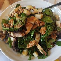 nice salad with arugula ανδ musshrooms