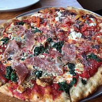 Two different specials split on one pizza.