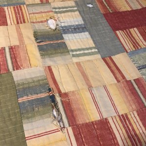 Holes in bedspread