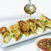 Yummy Chinese Dumplings with homemade sauce.