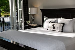 The Park On Main Hotel in Highlands, image may contain: Cushion, Home Decor, Bed, Lamp
