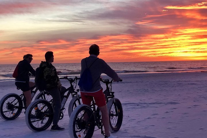 bike riding on the beach