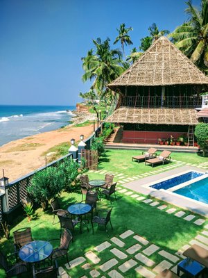 BCanti Boutique Beach Resort in Edava, image may contain: Resort, Hotel, Chair, Summer