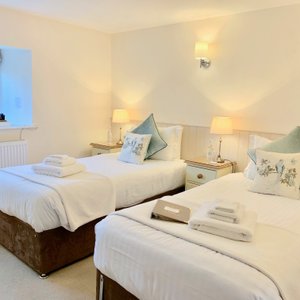 The twin room in the Superior Family Suite for 5, situated in the Farm House. 