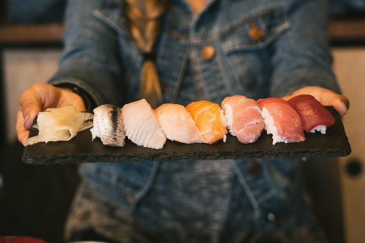 Sushi-making class taught by a professional master sushi chef and  sake-tasting tour