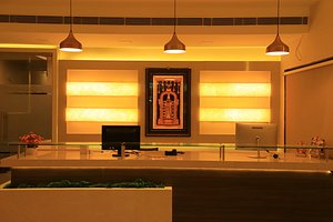 TM Hotel in Madurai, image may contain: Lighting, Interior Design, Indoors, Altar