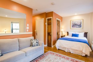 Copley House in Boston, image may contain: Corner, Home Decor, Cushion, Furniture