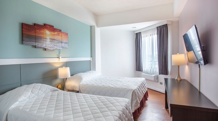 Relax in our standard twin or Family Room.