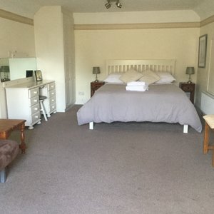 Cottage annex a spacious room with a king size bed and a sofa bed 