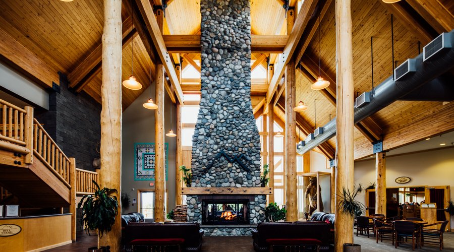 Enjoy the view as you relax next to our 46-foot river rock fireplace