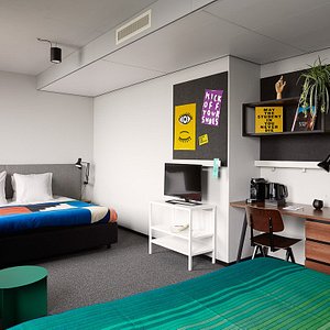 The Social Hub Eindhoven in Eindhoven, image may contain: Dorm Room, Furniture, Bedroom, Screen