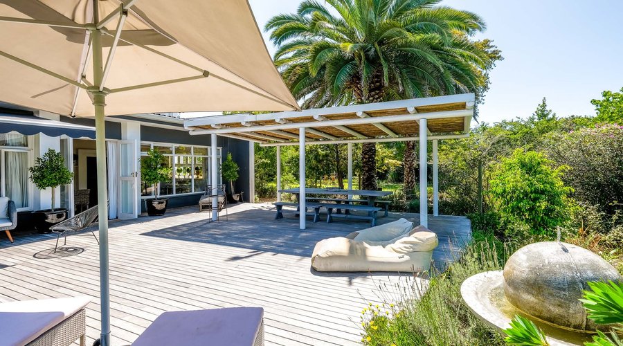 Deck with Pergola and Sun Loungers