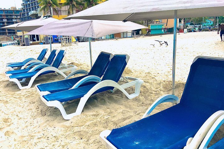 2024 2 Lounge Chairs & 1 Beach Umbrella provided by Tiki Bikini Hut