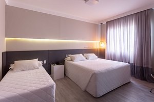 Hotel Melo in Balneario Camboriu, image may contain: Bed, Furniture, Home Decor