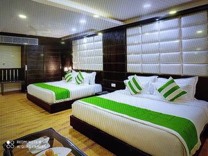 Cygnett Park Di Arch in Lucknow, image may contain: Hotel, Resort, Interior Design, Furniture