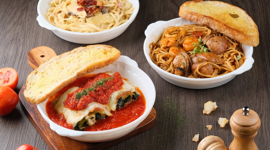 Lasagna Timbale (chicken and spinach lasagna), Pasta Catalan (clams/mussels, shrimps, squid, chorizo in tomato ragout), and Bacon Alfredo (bacon, mushrooms and cream) are just some of the pasta choices in Eastwood Cafe+Bar's menu. 