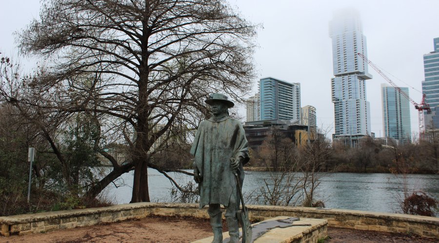 Beautiful setting along the river, with downtown Austin in the background.