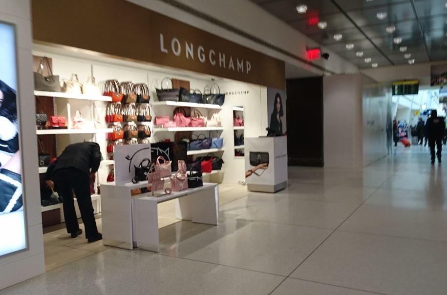 Longchamp duty discount free prices