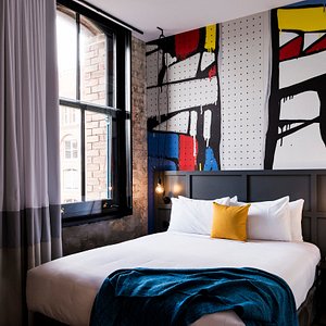 The Woolstore 1888 by Ovolo in Pyrmont, image may contain: Bedroom, Furniture, Indoors, Home Decor