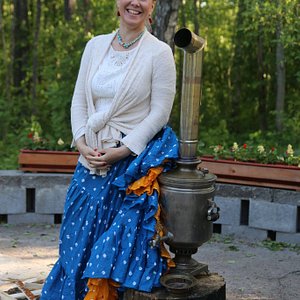 Russian samovar (tea pot) and me at our country house