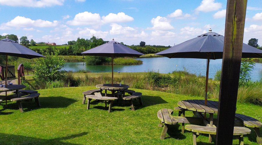 Lakeside Café outdoor seating with stunning views. 