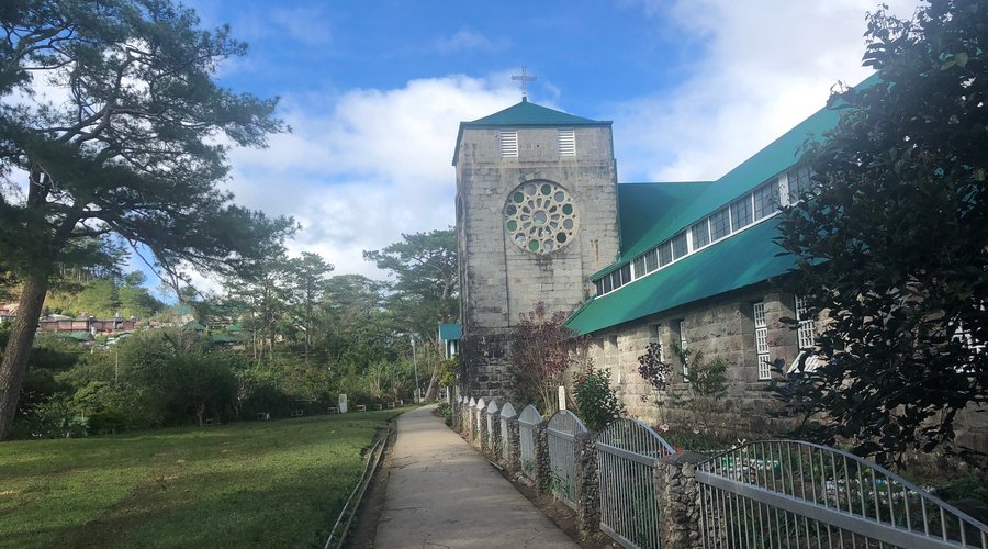 St Marys Church   The Church is a prominent structure in the town of Sagada.It was built in 1904 by American Missionaries. Glass stained rose petals on the main building can be seen on top of  the altar . Natural light passes through it exhibiting an awesome effect.