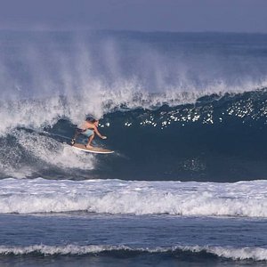 Sustainable surfer girl swimwear review of Anowi Surf. On location in Krui  Sumatra, Indonesia 