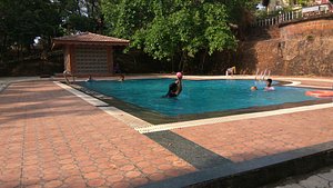 Om Beach Resort in Gokarna, image may contain: Pool, Water, Villa, Person