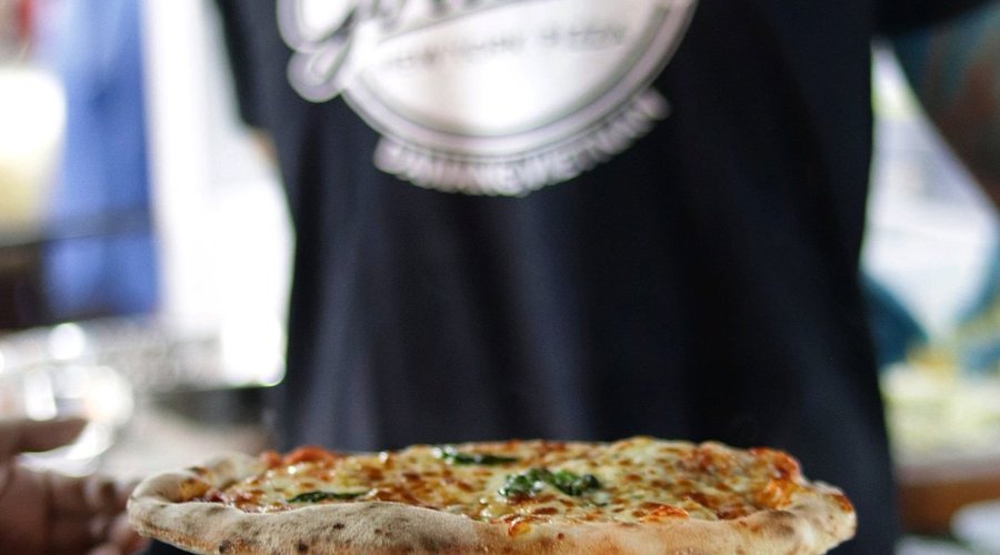 Every pizza at Gordon's is handmade and hand-stretched. The Manhattan Margherita is a crowd favorite.