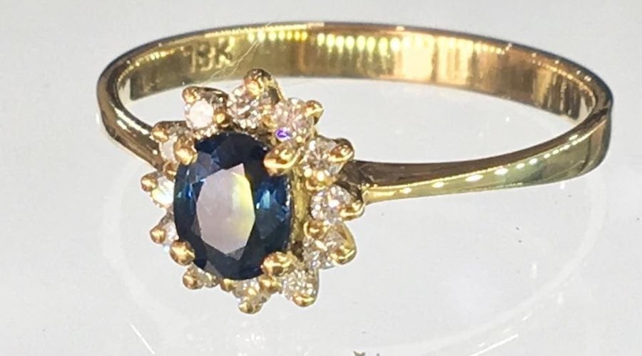 Good Quality Natural Blue Sapphire and Diamonds set on 18K Yellow Gold. Size 54