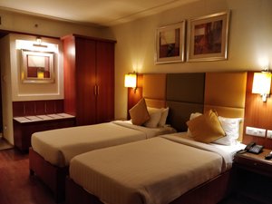 Hampshire Plaza in Hyderabad, image may contain: Hotel, Furniture, Bed, Bedroom