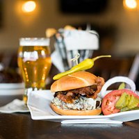 Come enjoy a bacon cheese burger from our pub menu.