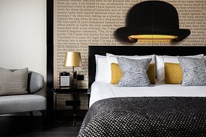 Holmes Hotel London in London, image may contain: Cushion, Home Decor, Lamp, Table Lamp