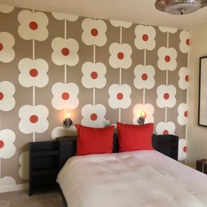 The bed was very comfortable, and the hostess provided current convertors on both sides allowing for easy cell phone charging.