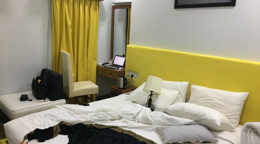 The room is crowded and the desk by the bed is very, very small.  To put things on the desk, I had to put the lamp on the bed.