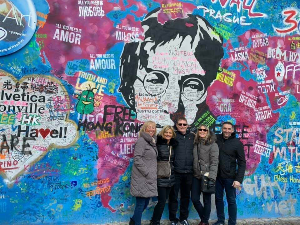 Why is there a John Lennon walk in Prague?