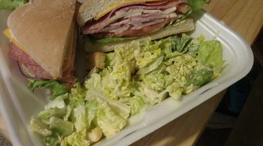 Delicious!! ! Old fashioned club on ciabatta bread.  Ceaser salad had perfect amount of dressing.