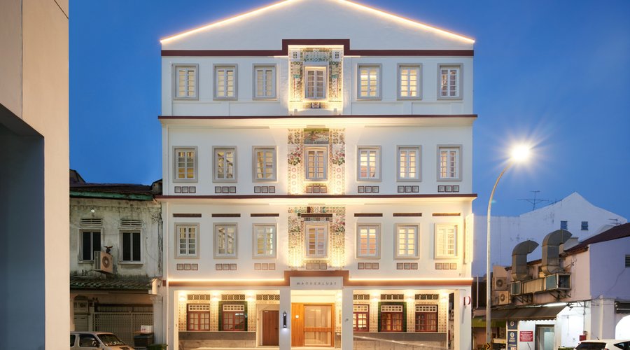 Wanderlust Hotel - Night view of facade